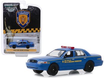 2006 Ford Crown Victoria \New York City Taxi and Limousine Commission\" (\""TLC\"") Blue \""Hobby Exclusive\"" 1/64 Diecast Model Car by Greenlight"""