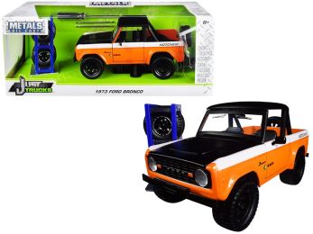 1973 Ford Bronco Metallic Orange and Matt Black \KC HiLiTES\" with Extra Wheels \""Just Trucks\"" Series 1/24 Diecast Model Car by Jada"""