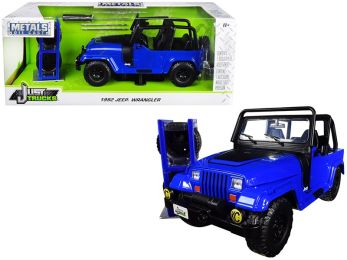 1992 Jeep Wrangler Dark Blue with Extra Wheels \Just Trucks\" Series 1/24 Diecast Model Car by Jada"""
