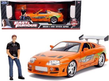 1995 Toyota Supra Orange Metallic with Lights and Brian Figurine Fast & Furious Movie 1/18 Diecast Model Car by Jada
