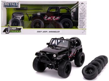 2007 Jeep Wrangler Black with Extra Wheels \Just Trucks\" Series 1/24 Diecast Model Car by Jada"""