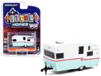 1962 Shasta Airflyte Travel Trailer White and Teal with Red Stripe Hitched Homes Series 10 1/64 Diecast Model by Greenlight