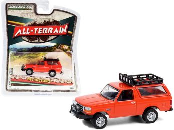 1995 Ford Bronco Sport with Off-Road Parts Orange \All Terrain\" Series 11 1/64 Diecast Model Car by Greenlight"""