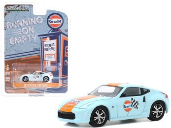 2020 Nissan 370Z Coupe Light Blue with Orange Stripe \Gulf Oil\" \""Running on Empty\"" Series 11 1/64 Diecast Model Car by Greenlight"""