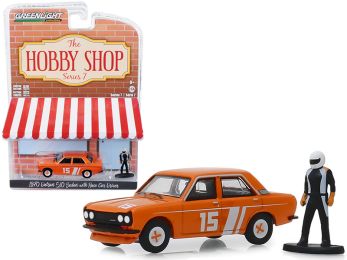 1970 Datsun 510 4-Door Sedan #15 Orange with Race Car Driver Figurine \The Hobby Shop\" Series 7 1/64 Diecast Model Car by Greenlight"""