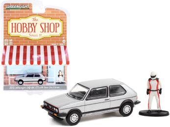 1976 Volkswagen Golf MkI GTI Silver Metallic and Race Car Driver Figurine The Hobby Shop Series 11 1/64 Diecast Model Car by Greenlight