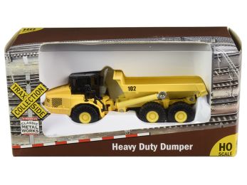 Heavy Duty Dumper Truck Yellow \TraxSide Collection\" 1/87 (HO) Scale Diecast Model by Classic Metal Works"""